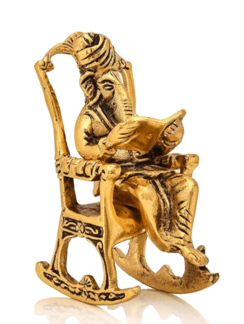 Lord Ganesha Idol Reading Book, Vastu